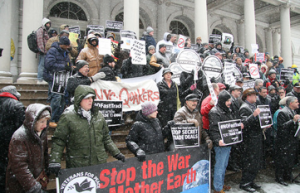 Labor, environmental, social-justice and other groups rally on the steps of New York City Hall on January 14 to demand Congress vote against fast-track legislation.  (Photo courtesy of New York State AFL-CIO)